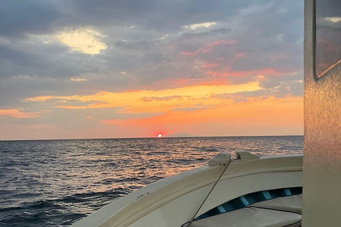 2-Hour Sorrento Coast Sunset Cruise with Dinner Experience - Puolo Bay, fishing boats, and a slower pace