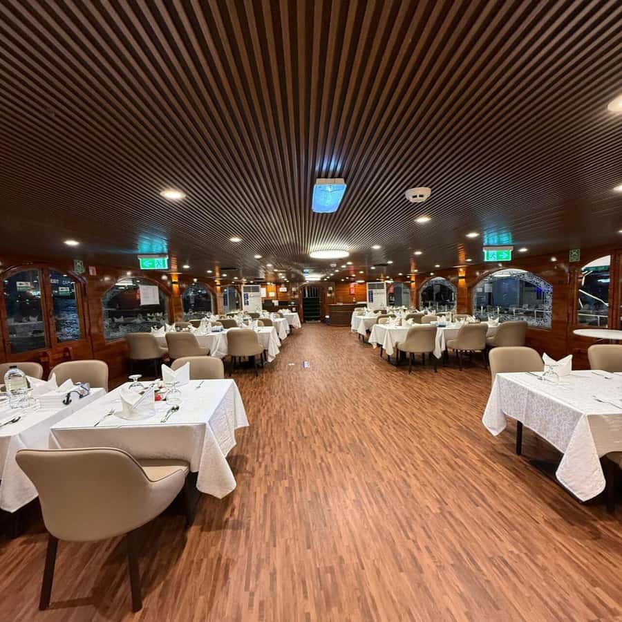 5-Star Marina Dhow Dinner Cruise With Live Entertainment - Boarding a traditional-style dhow in modern Dubai