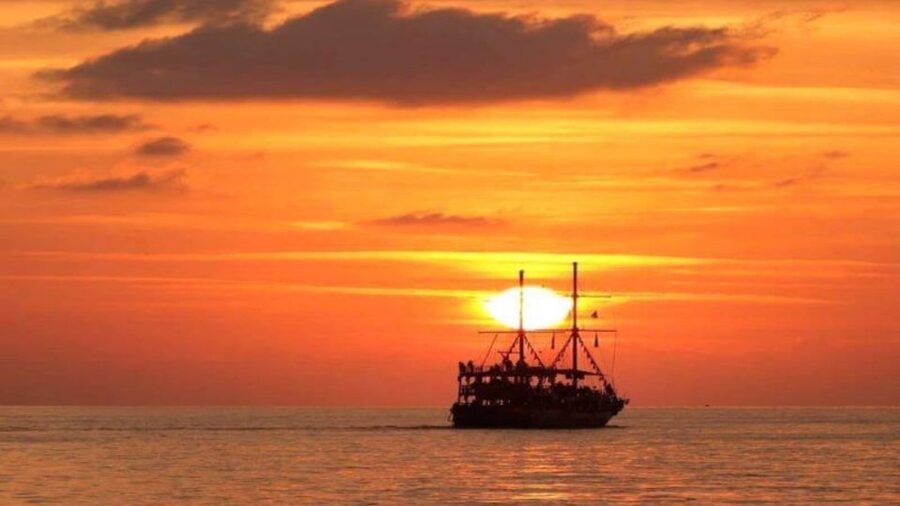 Alanya: Sunset Cruise with Dinner - Leaving Alanya Harbor beside the Red Tower
