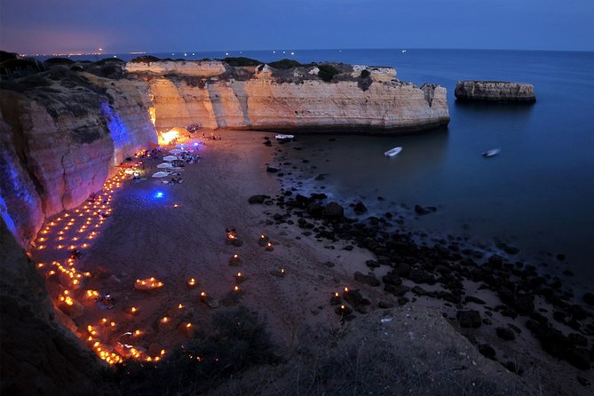 Albufeira: 6-Hour Sunset Dinner Catamaran Cruise with Open Bar - Sunset, music, and the fire dancer