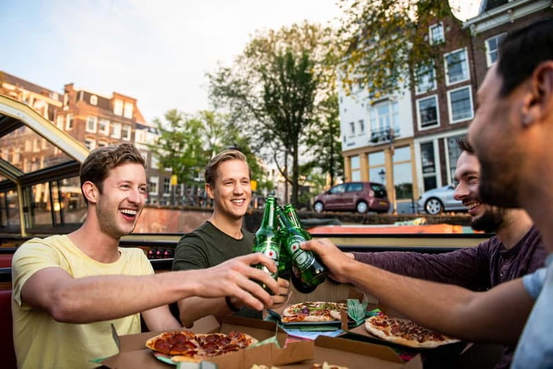 Amsterdam: Original Pizza Dinner Cruise + Unlimited Drinks - Boarding at Damrak Pier 5 near Amsterdam Centraal