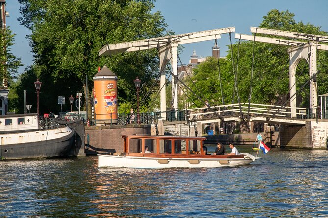 Amsterdam Private Dinner Cruise incl Drinks & 2-course Dinner 2hr - A private dinner cruise with Amsterdam at your window