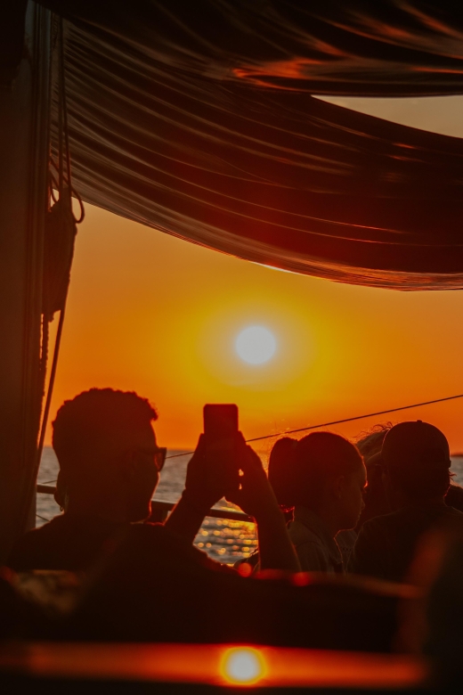 Argostoli: Sunset Cruise with Swim Stops, Dinner, and Wine - Leaving Argostoli and settling into the boat