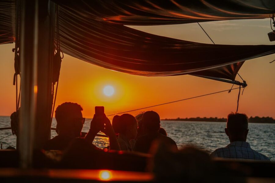 Argostoli: Sunset Cruise with Swim Stops, Dinner, and Wine - Xi Beach, red sand, and the weather backup