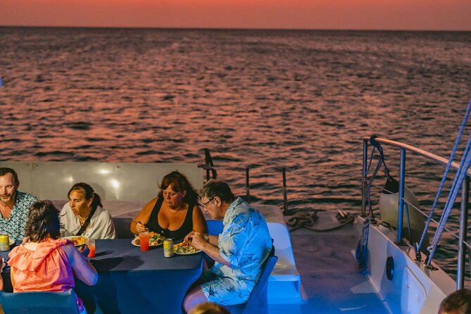 Aruba Sunset Sail Dinner Cruise with Open Bar by Catamaran - Open bar, music, and the social mood
