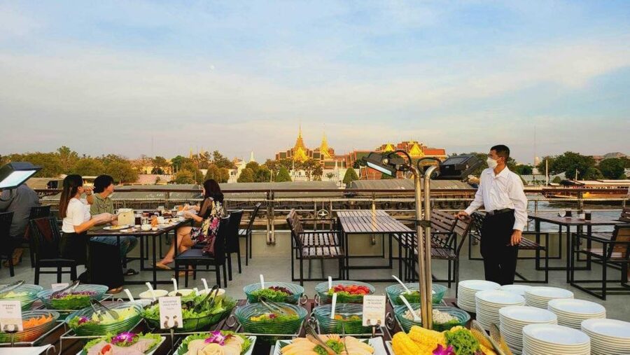 Bangkok: Calypso Cabaret & Dinner Cruise with Hotel Transfer - Moving from the boat to the theater