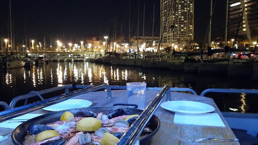 Barcelona: Private Evening Cruise with Dinner and Drinks - Paella, drinks, and the meal onboard
