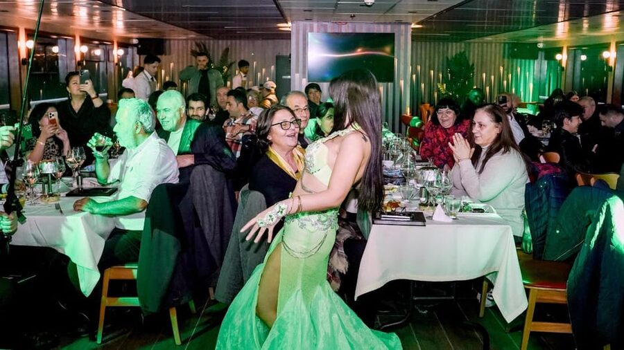 Bosphorus Dinner Cruise & Dance Shows with Private Table - The first views: Dolmabahçe Palace and the waterfront