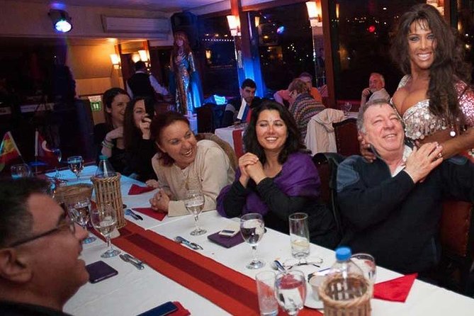 Bosphorus Dinner Cruise & Live Show – Private Table - Dolmabahce Palace from the water