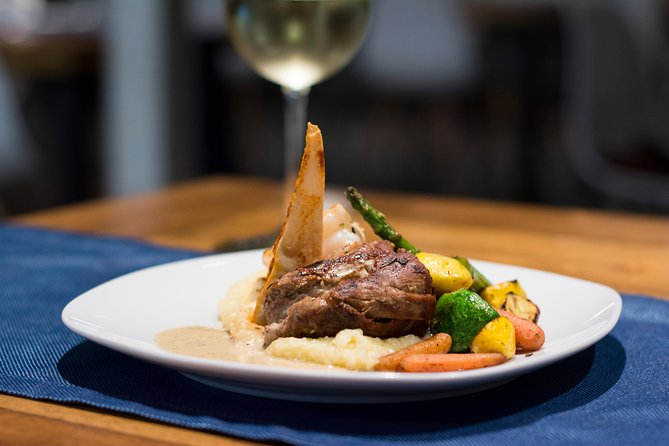 Cabo Sunset Dinner Cruise with Live Music & Open Bar on Cabo Wave - The meal brings you below deck