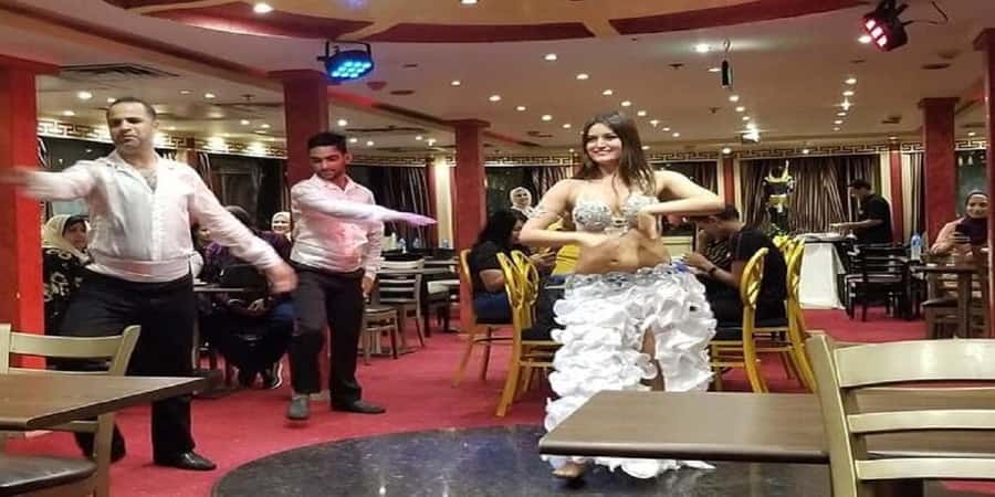 Cairo: Buffet Dinner Cruise with Folkloric Show - Boarding the boat and finding a seat