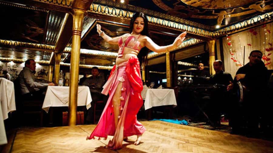 Cairo: Nile Maxim Luxurious Dinner Cruise with Dance Show - Twilight views from the central Cairo dock