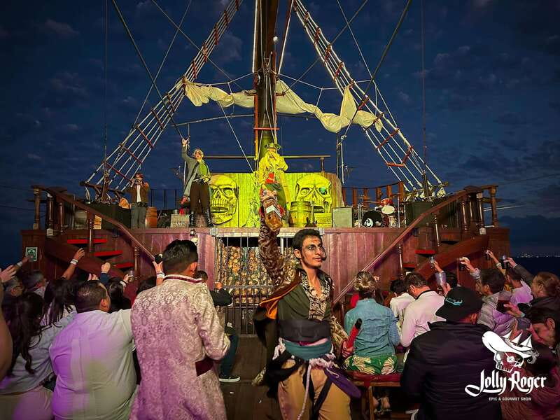 Cancún: Jolly Roger Pirate Dinner Cruise 2025 - Boarding the Jolly Roger at Punta Sam