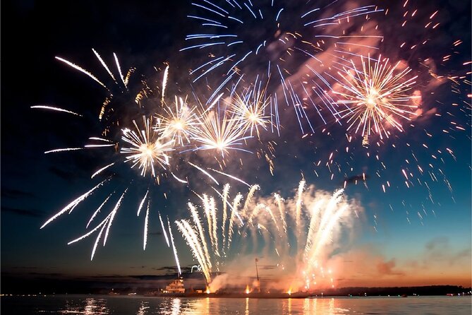 City Cruises Chicago: Fireworks Premier Plus Dinner Cruise - Chicago River views from a dinner table