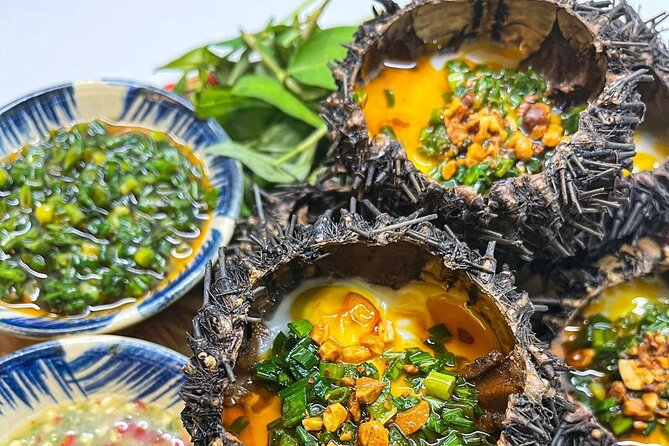 Da Nang By Night: Seafood dinner, night market and cruise trip - Riding through Da Nang on a motorbike