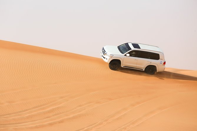 Desert Safari with BBQ Dinner and Landcruiser Pickup - What the 45-minute dune drive is really like