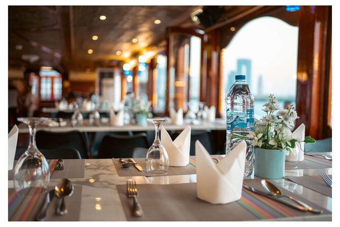 Dhow Cruise with Dinner at Dubai Al Seef - Boarding a restored wooden dhow