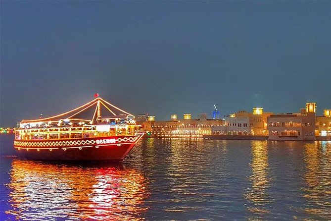 Dubai: 2-Hour Evening Dhow Cruise and Dinner - Boarding a traditional dhow after sunset