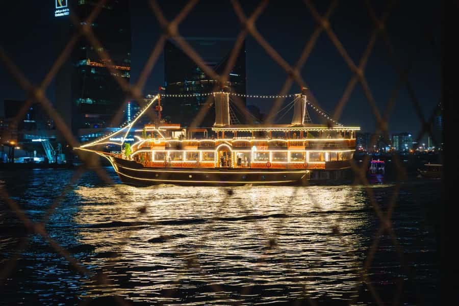 Dubai: Al Seef Largest Dhow Dinner Cruise with Live Show - A slow evening on Dubai Creek