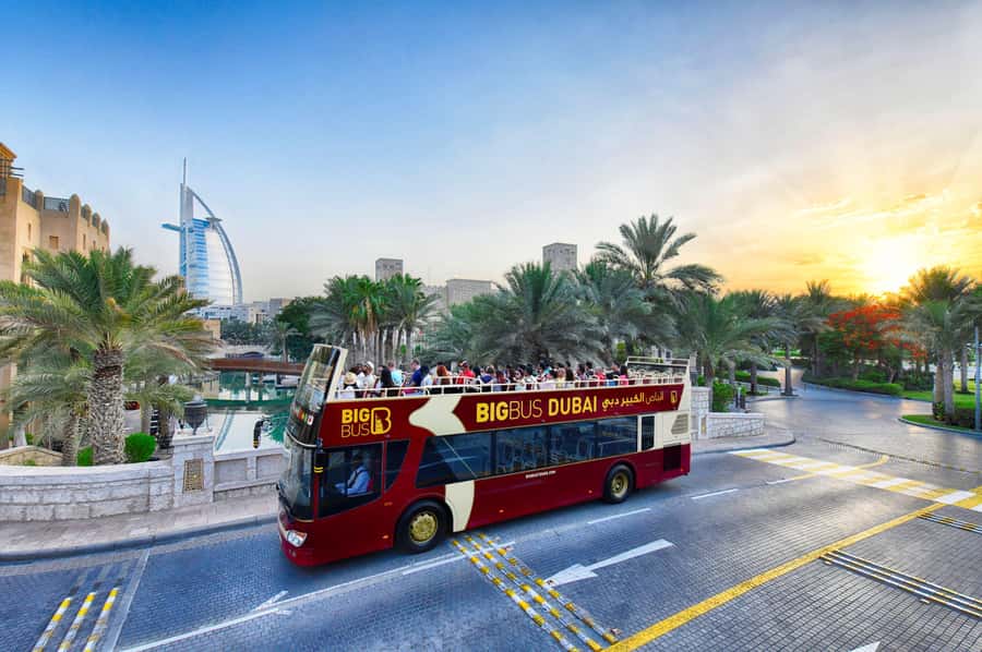 Dubai: Big Bus Panoramic Night Tour & Optional Dinner Cruise - Burj Khalifa and Dubai Mall after sunset