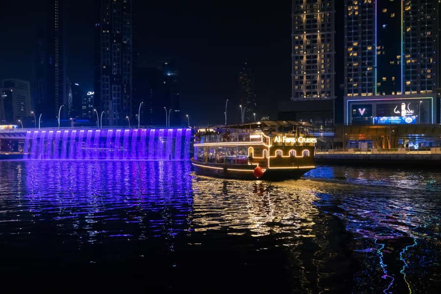 Dubai: Luxury Canal Dinner Cruise with Optional Transfers - The waterfall bridge and Dubai’s illuminated skyline