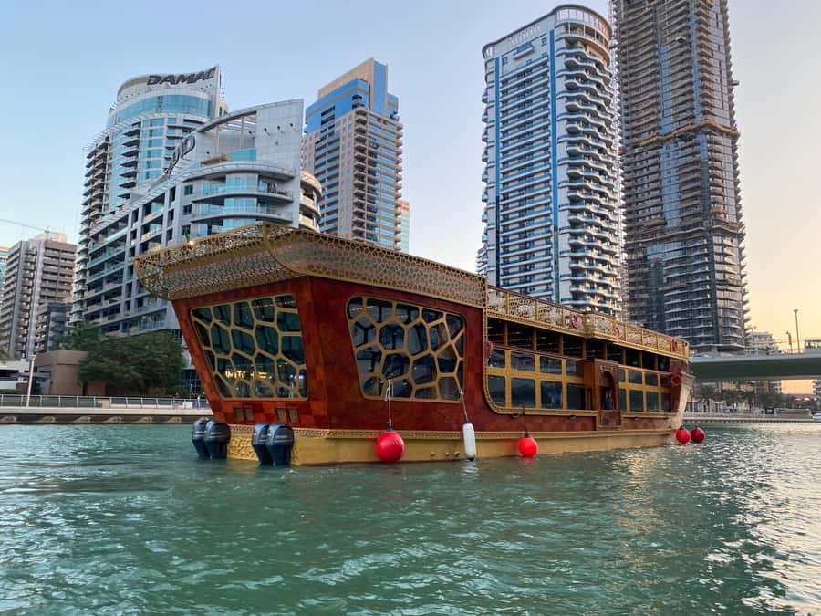Dubai Marina: Dinner Cruise in a Traditional Boat - Boarding the Ocean Empress behind Silverene Tower