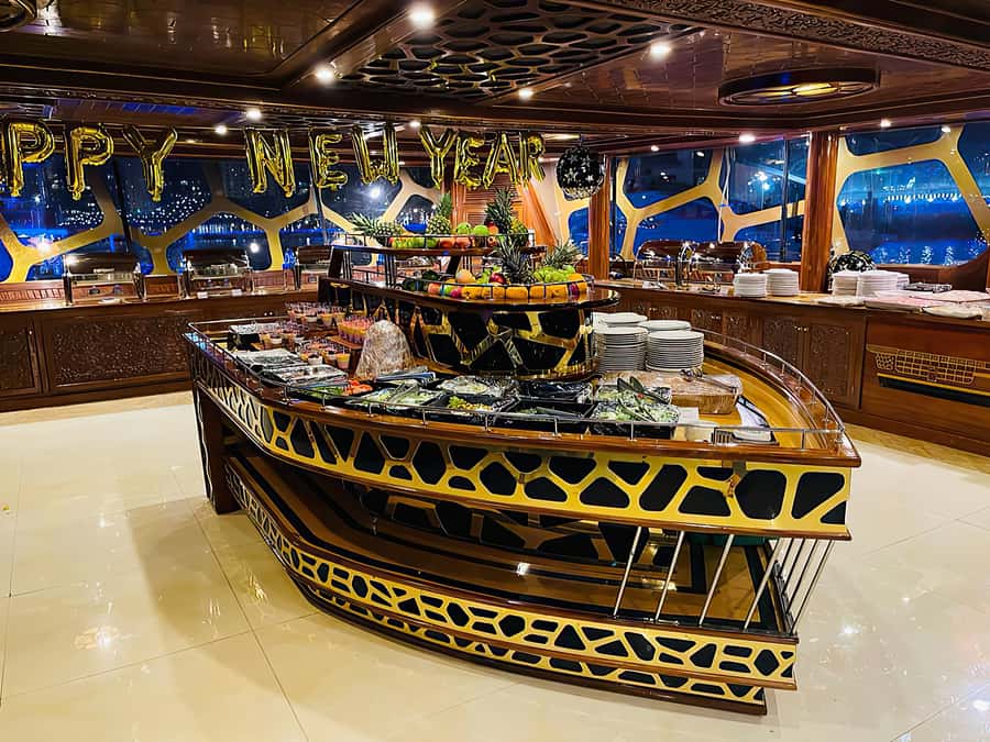 Dubai Marina: Dinner Cruise in a Traditional Boat - Dubai Marina lights up after sunset