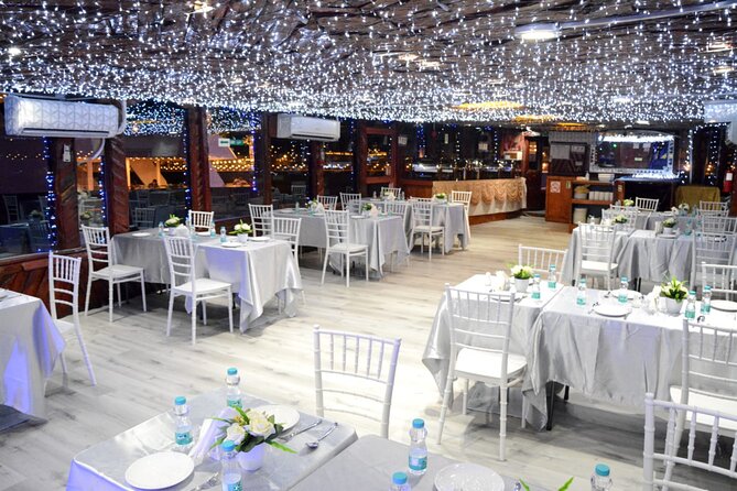 Dubai Marina Unique Dhow Cruise Buffet Dinner and Belly Dance - Dinner on the dhow, with music in the background