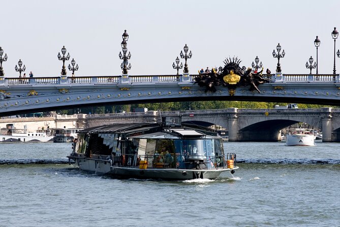 Early evening Dinner Cruise with drinks by Bateaux Parisiens - Pont Alexandre III and the grand western monuments