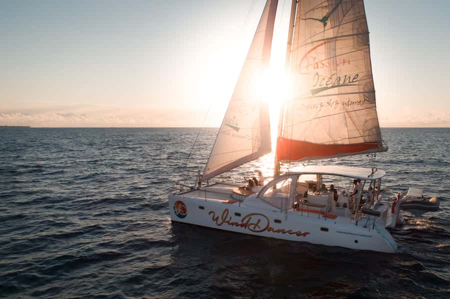 Grand Baie: Private 4-Hour Premium Sunset and Dinner Cruise - Coin de Mire and its sea cliffs