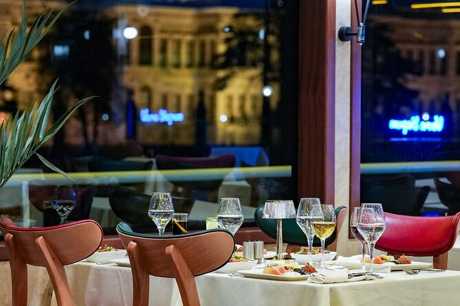 Istanbul: Bosphorus Dinner Cruise with Turkish Night Show - The first views: Dolmabahçe, Çırağan, and Ortaköy