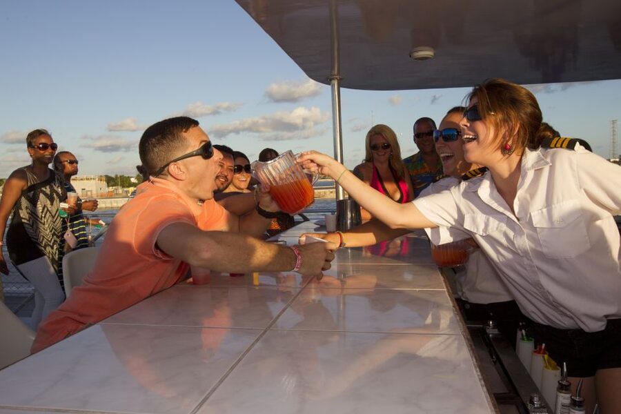 Key West: Sunset Dinner Cruise with Open Bar & Live Music - Who Will Enjoy The Party Cat Most?