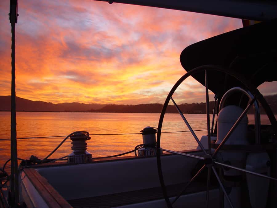 Knysna Sunset Sailing Cruise with Light Dinner and Wine - Passing the Knysna Heads When Conditions Allow