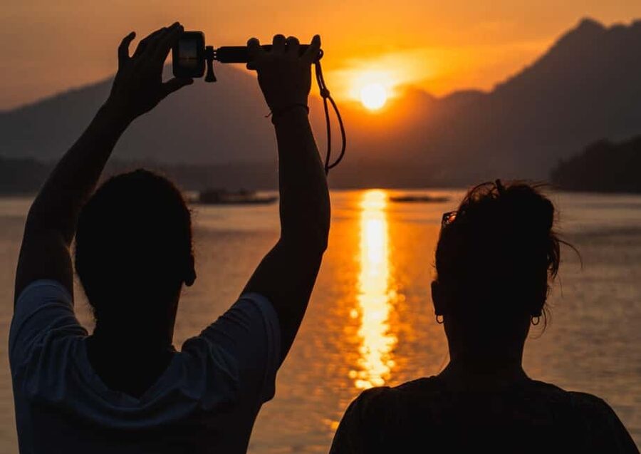 Luang Prabang: Mekong Sunset Cruise & Lao Tasting Dinner - A Lao mojito before the light changes