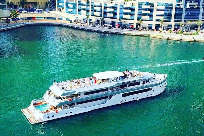Luxury 7 Star Mega Yacht Dinner Cruise with International Buffet - Tanoura dancing, live music, and the evening mood