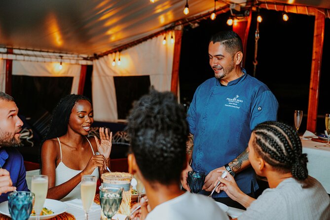 Luxury Four-Course Caribbean Dinner Cruise Experience - Live music and the mood onboard