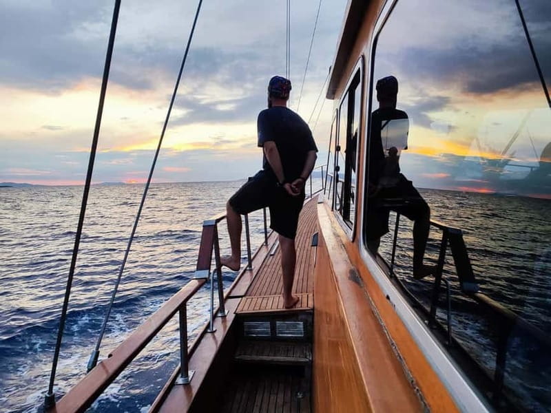 Mykonos: Sunset Boat Cruise with Light Dinner & Drinks - Ornos, Psarou, and Platis Gialos: the first coastal views