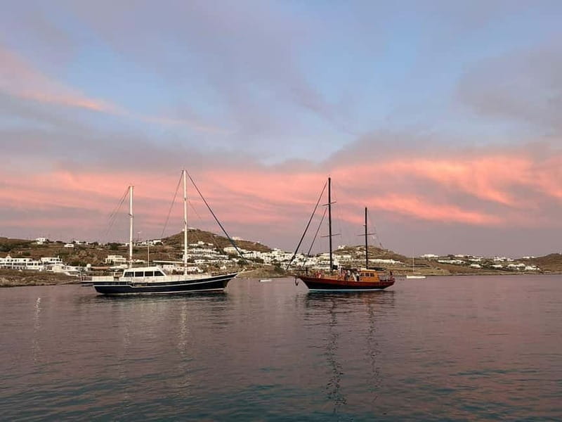 Mykonos: Sunset Boat Cruise with Light Dinner & Drinks - Elia: the first proper swim stop
