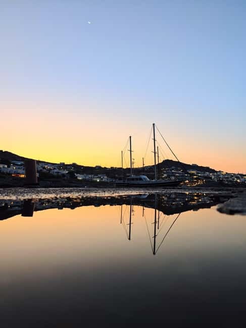 Mykonos: Sunset Boat Cruise with Light Dinner & Drinks - Super Paradise: swimming with a famous beach in view
