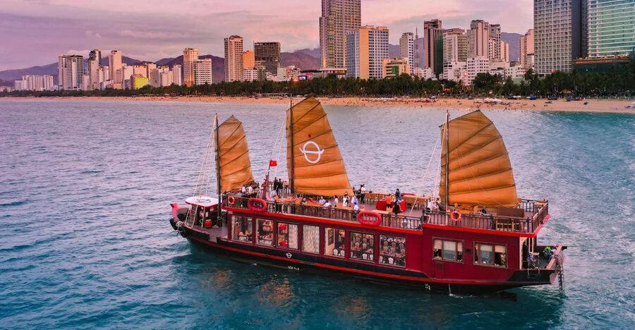 Nha Trang: Romantic Sunset Cocktails and Dinner Cruise - Boarding the traditional junk boat at Nha Trang port