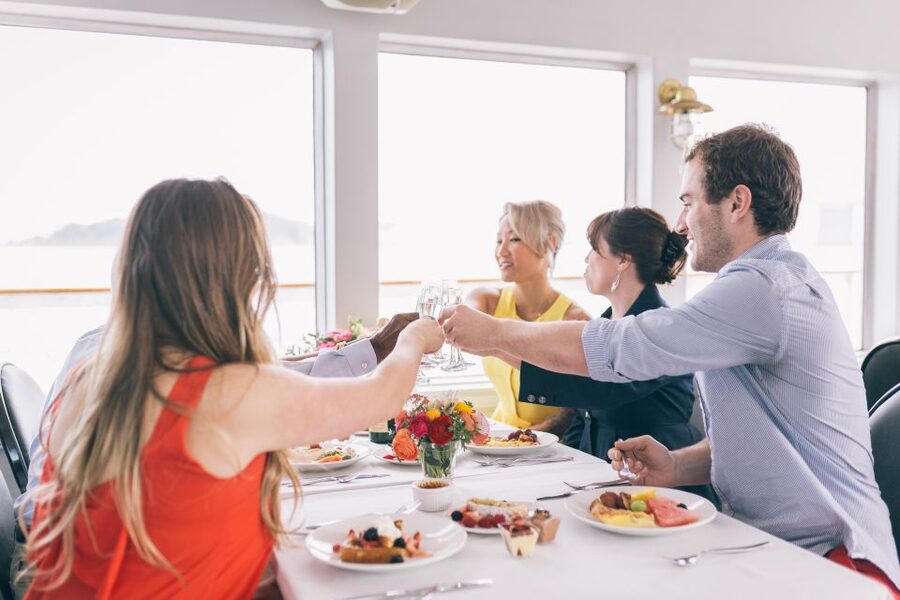 NYC: Christmas Eve Buffet Lunch or Dinner Harbor Cruise - Seating, boarding, and practical details
