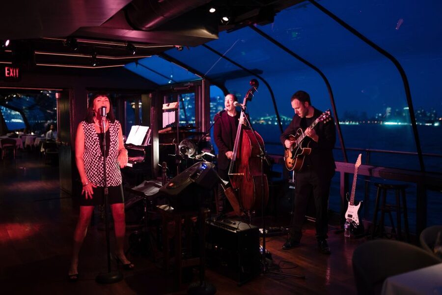 NYC: Christmas Eve Gourmet Brunch or Dinner Harbor Cruise - Live music changes the pace of the meal