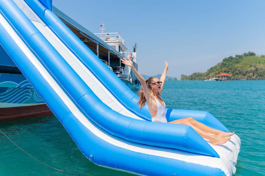 Phuket: Phang Nga Bay Lunch and Dinner Sunset Party Cruise - A live DJ turns the return trip into a party