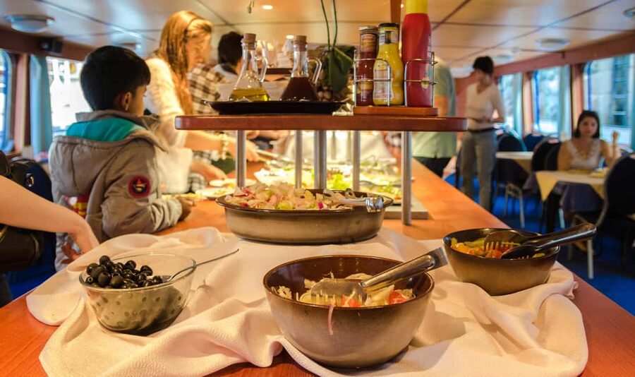 Prague: Dinner Cruise with Hotel Pickup and Drop-off - Boarding with a welcome drink