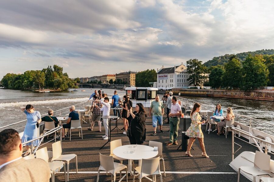 Prague: Sightseeing Dinner Cruise on Open-Top Glass Boat - Choosing between standard and upgraded seating