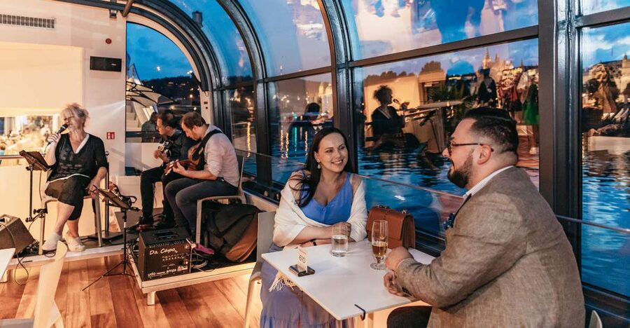 Prague: Sightseeing Dinner Cruise on Open-Top Glass Boat - Charles Bridge and Rudolfinum after dark