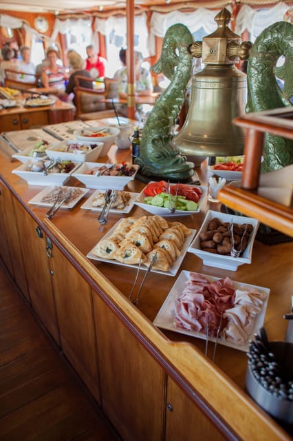 Prague: Vltava River Evening Dinner Cruise - The buffet and the onboard atmosphere