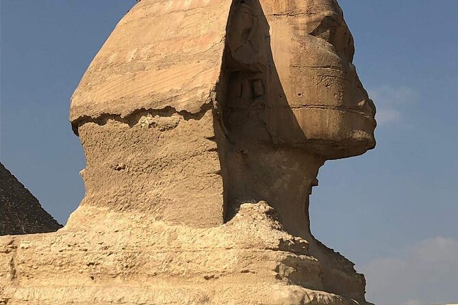 Private Guided Day Tour: Giza Pyramids, Egyptian Museum and Nile Dinner Cruise - Moving from ancient stones to the Egyptian Museum