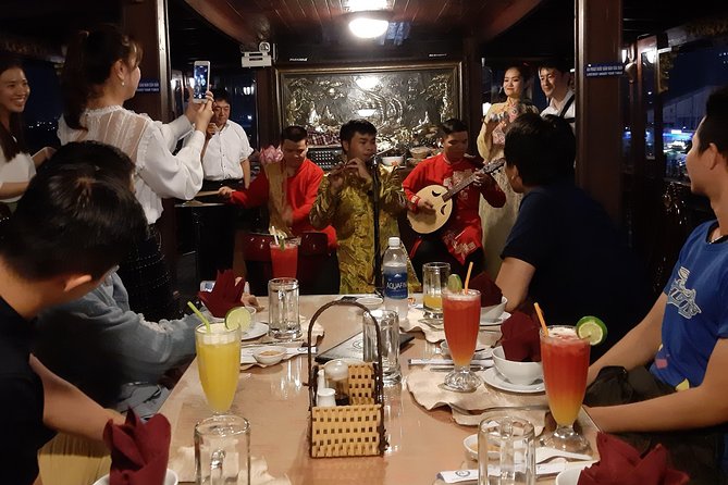 Private Saigon by night at Bitexco & Dinner Cruise - Seeing Saigon from a Motorbike After Dark