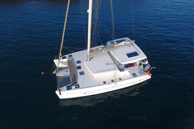 Private Sunset Cruise with Full Greek Dinner - The Caldera villages from below